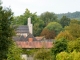 Photo suivante de Condat-sur-Vézère Vue sur le clocher-mur fortifié.