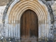 Photo suivante de Javerlhac-et-la-Chapelle-Saint-Robert Eglise Saint etienne : le portail sous le clocher.