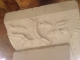 Motif sculpté sur un chapiteau de colonne de la halle.