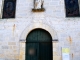 Photo suivante de Notre-Dame-de-Sanilhac Le portail de l'église Notre-Dame-des-Vertus.