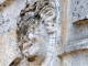 Photo précédente de Orliac Faciès grimaçant au dessus du portail de l'église.