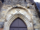 Photo suivante de Pompignac Le portail gothique de l'église.