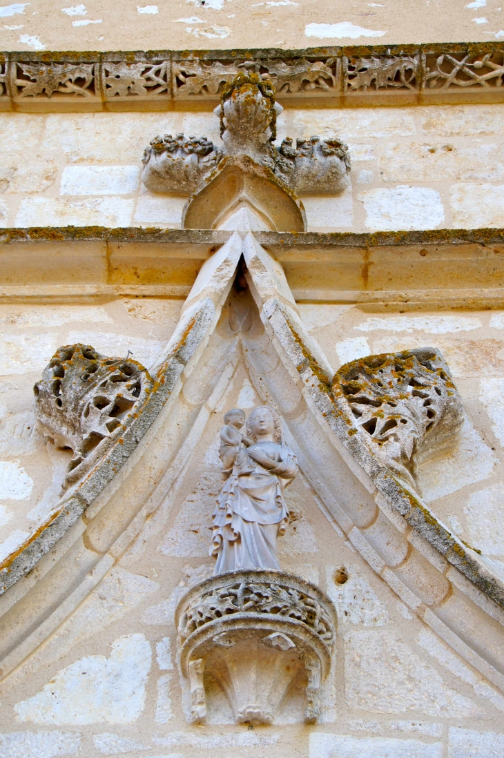 Détail : le portail de l'église Saint-Cricq. - Parleboscq