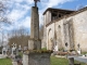 Croix ancienne et église Sainte-Raffine.