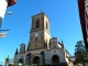 L'église Notre-Dame de l'Assomption du XIVe siècle avec un porche roman ouvrant sur un cimetière-préau.