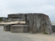 le village vu d'un tobrouk (bunker individuel du mur de l'Atlantique) à Aneslles