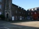 Photo suivante de La Haye-du-Puits Le château, la cour d'honneur et les anciennes écuries