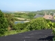 Photo précédente de Omonville-la-Petite les toits et la mer au loin