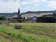 Photo suivante de Arnay-sous-Vitteaux vue sur le village et l'église