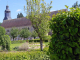Photo suivante de Thiron Gardais église abbatiale Sainte Trinité vue du jardin de l'abbaye