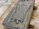 Dans le centre de la nef de l'église Abbatiale : pierre tombale.