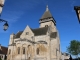 L'église Saint Marcel : vue d'ensemble avec le chevet et le clocher.