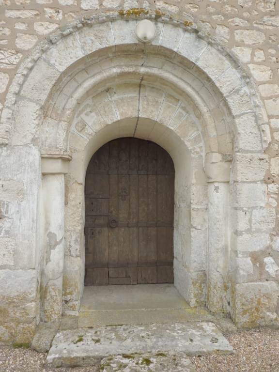 Eglise Saint Martin : porte Romane avec fers - Brosville