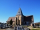 Photo suivante de Condé-sur-Iton L'église Saint Martin. Sur le côté sud, on peut voir une tour carrée couverte en ardoise. La toiture de l'église est, quant à elle, en tuile.
