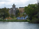 Neuville : l'église vue du canal de la Meuse