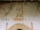 Détail de la frise du portail de l'église du hameau d'Aunac.