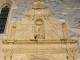 Photo suivante de Prades-d'Aubrac Eglise Saint Laurent : Sous le porche, se trouve une piéta du XVe siècle.