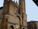 Photo suivante de Montesquieu-Volvestre Eglise Saint-Victor (XIIIe siècle), dont la façade fortifiée massive en briques rappelle que l'église, lieu de recueillement, faisait aussi partie du système de défense de la ville.