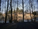 Photo suivante de Liessies le château de la Motte aperçu parmi les arbres