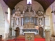 Photo précédente de Azé Magnifique retable classé du maître autel daté de 1634, représentant l'Enfant Jésus désignant sa croix, accompagné de la Vierge, de St Joseph, de St jacques et de la donatrice, Melle de la fraudière.