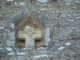 Christ en croix. Niche. Fronton de l'église Saint- Aignan