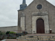 Photo précédente de Le Fenouiller l'église Saint Laurent : entrée et clocher en bec d'hirondelle