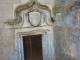 Photo suivante de Chatenet Petite porte renaissance finement moulurée et surmontée d'un blason.