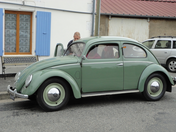 Dutch tourists visit Hiesse in their 60 year old Volks Wagon Beetle.