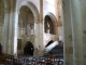 Photo suivante de Saint-Amant-de-Boixe Eglise abbatiale : grand escalier de bois et chapelle du saint sacrement.