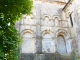Photo suivante de Saint-Amant-de-Boixe Eglise abbatiale. sur le mur ouest du bras nord du transept ou une décoration raffinée exhausse un portail aujourd'hui muré.