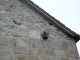Photo précédente de Sainte-Eulalie Une gargouille de tête de loup ou d'ours encastrée dans la façade