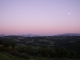 Vue de certains hameaux de Thusy depuis les hauteurs de Charmont par une soirée d'été