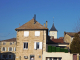 Photo suivante de Saint-Alban-de-Roche le clocher derrière les maisons