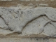 Photo précédente de Pommiers Lion, la queue entre les pattes sur la façade de l'Eglise Saint-Barthélémy