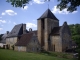 Photo suivante de Auriac-du-Périgord Le presbytére et le clocher de l'église.