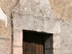 Photo suivante de Champagnac-de-Belair Porte secondaire de la chapelle de la Vierge du XVIIIe siècle.