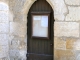 Petite porte de la façade sud de l'église Saint Martin à Champagne.