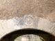 Détail : Linteau gravé. (porche attenant à l'église).
