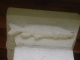 Motif sculpté sur un chapiteau de colonne de la halle.