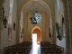 Eglise Sainte Quiterie de Nojals : la nef vers le portail.