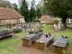 Photo précédente de Queyssac Des anciennes tombes du cimetière de l'église Saint Pierre ès Liens.