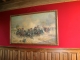 Le château de Bridoire : la salle de billard, toile représentant une scene de bataille du 1er empire