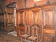 Le château de Bridoire : la salle à manger, boiseries en noyer de la fin du XIXe siècle