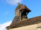 Photo suivante de Saint-Agne Profil du clocher-mur montrant l'abri des cloches à l'arrière.