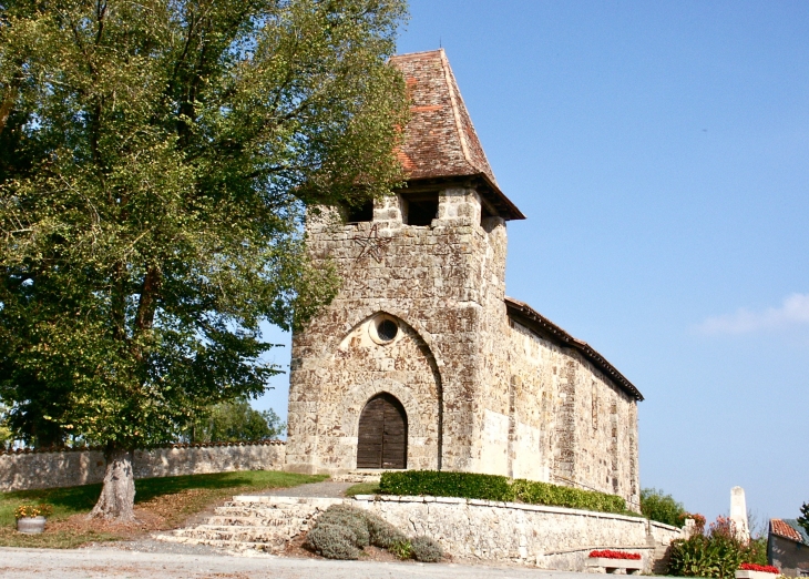 Eglise Saint-André, origine romane, remaniée au XIVe siècle et restaurée en 1878. - Saint-André-de-Double