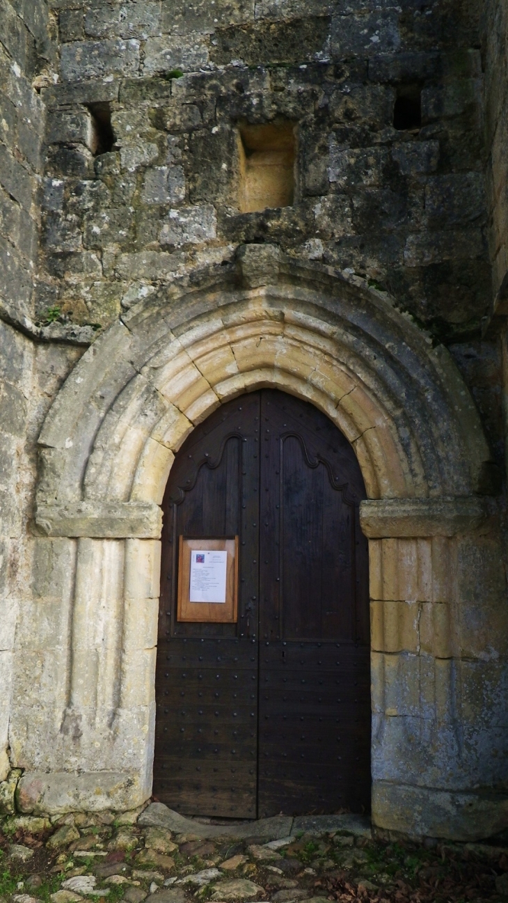 Le portail gothique de l'église de Mortemart. - Saint-Félix-de-Reillac-et-Mortemart