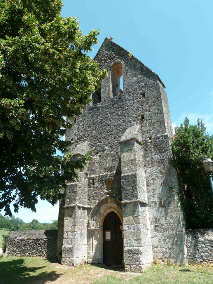 Mur clocher de l'église Saint Jean-Baptiste de Mortemart. - Saint-Félix-de-Reillac-et-Mortemart