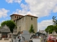 Photo suivante de Saint-Martial-Viveyrol Le chevet plat de l'église fortifiée Saint Martial.