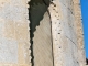 Une fenêtre du chevet de l'église Saint Romain de Mazérac.
