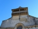 Le clocher mur de l'église Saint Romain de Mazérac.